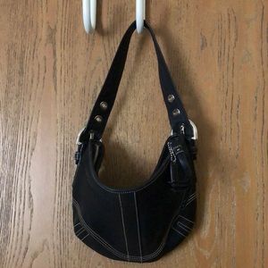 Coach purse black with tan piping. Silver hardware